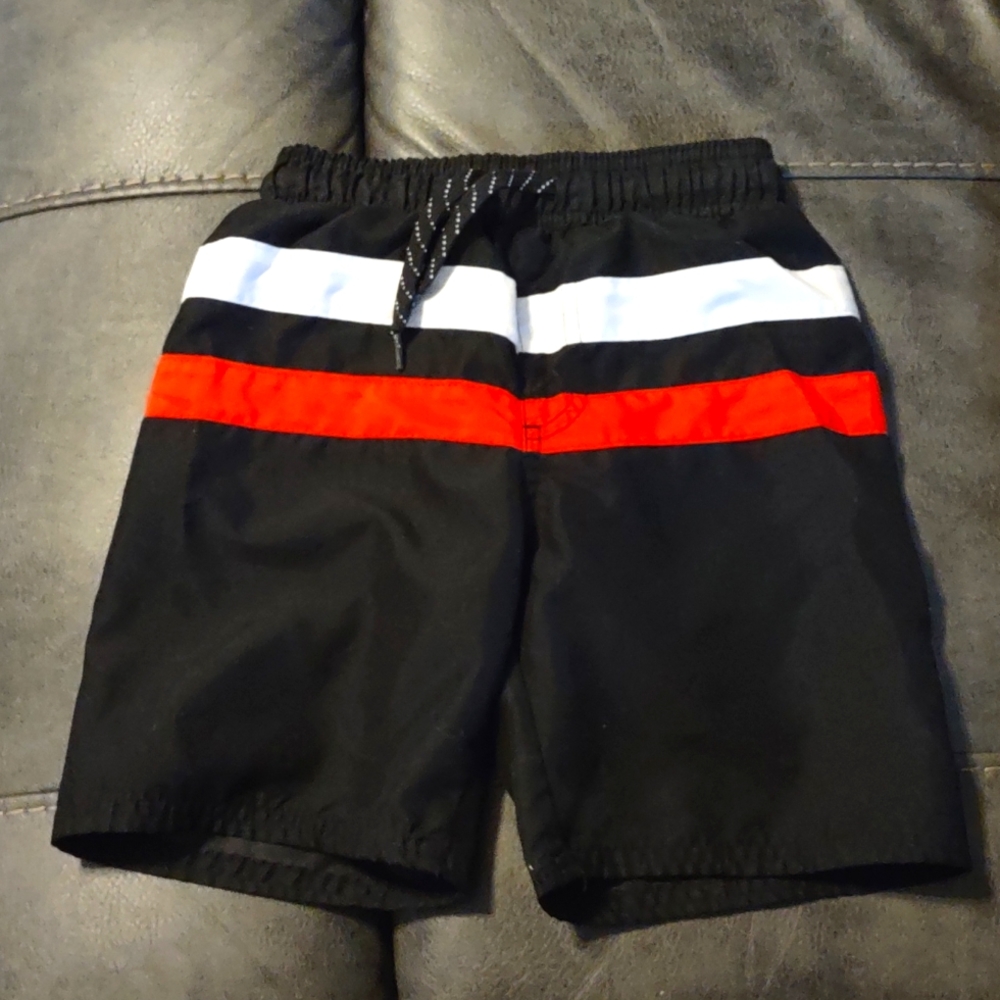 Sea-life Co. Swim trunks boys size small. Black with red and white stripes.